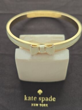kate spade "Take A Bow" Cream Bangle W/Gold Accents